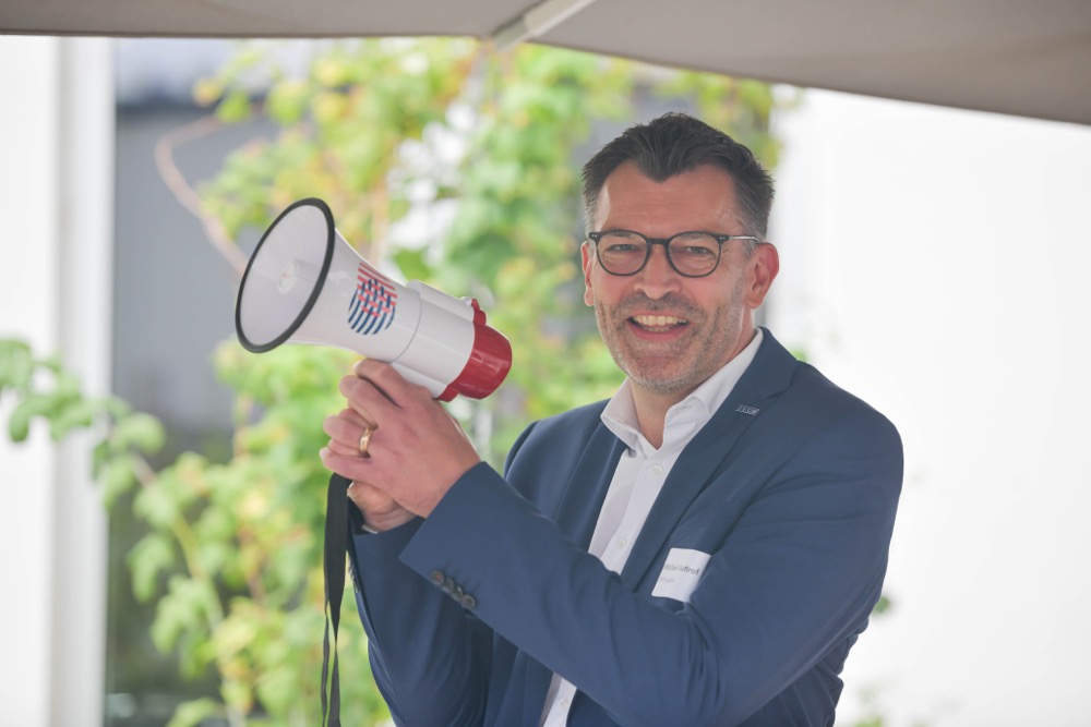 Regionalbotschafter Michael Guttrof macht Arbeitgeber auf Migranten als Arbeitnehmer aufmerksam.